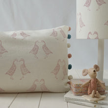 Load image into Gallery viewer, Block printed recycled linen cushion with pompoms - kissing geese design
