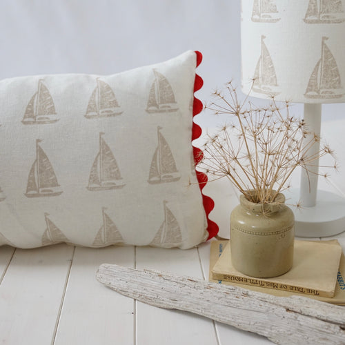 Block printed recycled linen cushion with pompoms - sail boat design