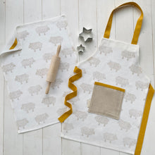 Load image into Gallery viewer, Children&#39;s recycled linen apron and baking set - curly sheep design
