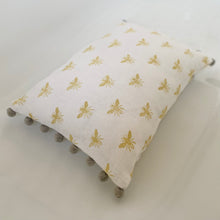 Load image into Gallery viewer, Block printed recycled linen cushion with pompoms - honey bee design
