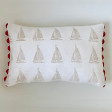 Load image into Gallery viewer, Block printed recycled linen cushion with pompoms - sail boat design
